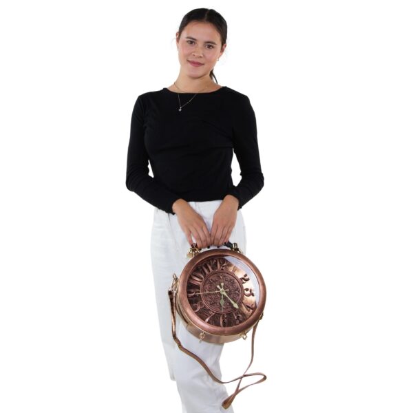 Woman holding Antique Clock Bag